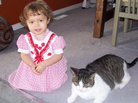 my baby girl with my cat- bestfriends