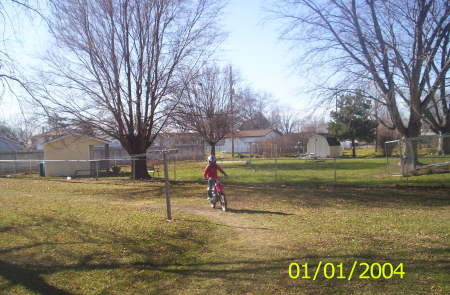 Jenna riding Billy's motorcycle