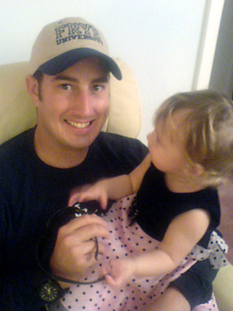 My oldest son with his daughter