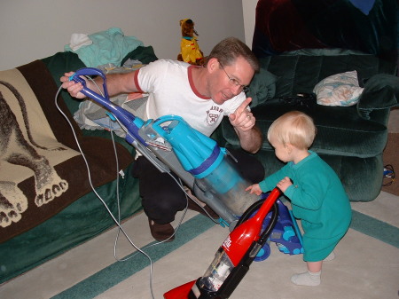 Father and Son vacuuming