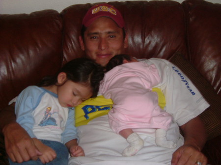 My husband Alex and our two girls.