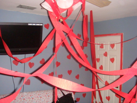 Jen decorates John's bedroom for Valentine's