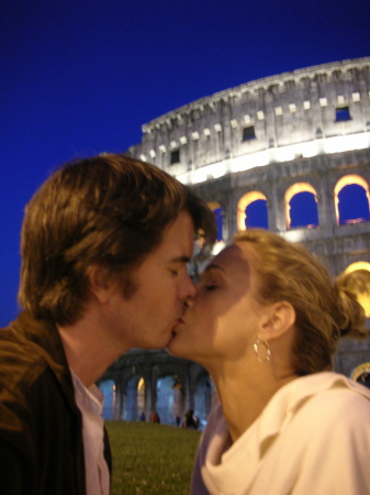 Kissing at the Coliseum in Rome on our Honeymoon