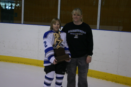 My son and I AFTER he won the league championship!  2007