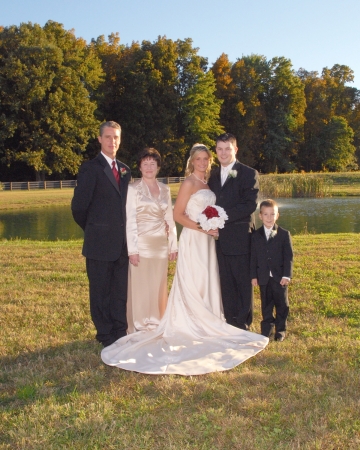 The bride and groom with Grandson