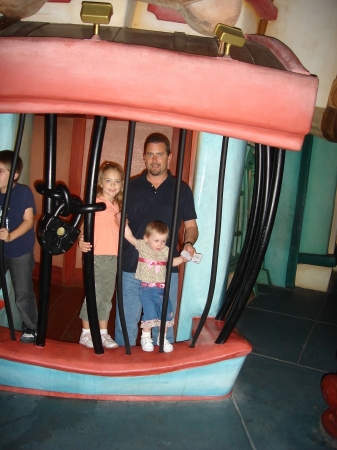 Daddy and his girls in Mickey's pokey