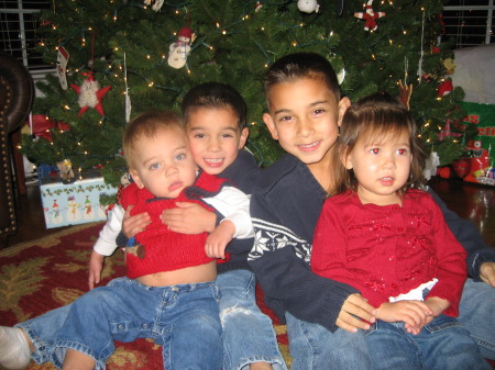 The boys and their cousin, Emma (the only girl I will ever have!)  :)  Christmas 2006