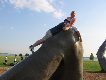 Kathy and I on a trip to DC having fun climbing a statue!