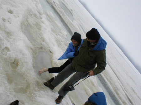 Putting my toe in the Actic Ocean, Barrow, AK ;Husband on right