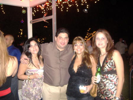Eddy Cruz w/wife, Karen Saavedra, Michelle Castaneda at Sandra Peebles Party December 2006