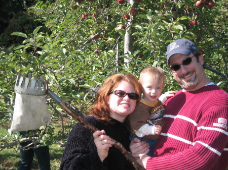 Charlie, Mommy and Daddy apple picking at Dr Davies