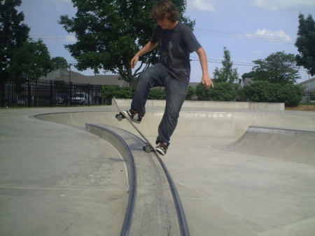 Andy rocks a skateboard