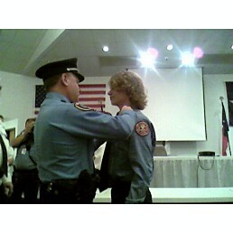 Wes (having his badge pinned on by his dad- my ex)