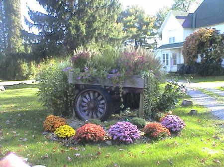 Old Flower Cart in front of the Farm House