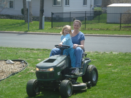 Jozi mowing the lawn w/ grandma