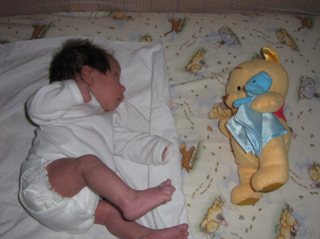 Kalista and her pooh bear at 2 months old