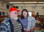 Husban John in red hat, and Judy in brown hair