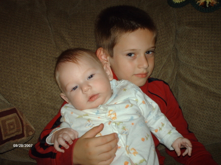 Cmneron holding his little brother Sebastian