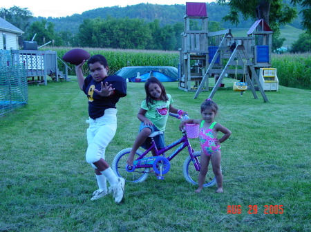 Derek, Abby, Mari just chilling in the backyard, Derek-future QB for Dallas