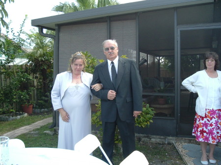 my daughters wedding..finally,and my exwife brenda in the back ground.