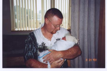 Proud Dad holding Brady