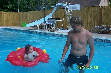Luke and big brother Matt in the pool