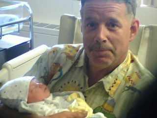 Me and my Grandson the day he was born!