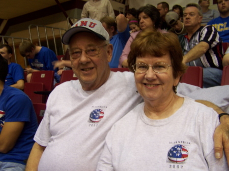 Ray and I, as proud grandparents, at NAIA Tournament in Branson, Grandson made All American