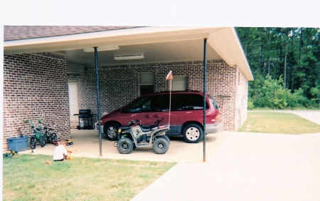 Our home before Katrina(back carport)