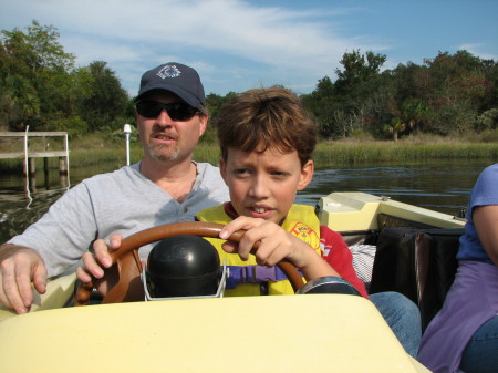 Dad and Brian At the helm