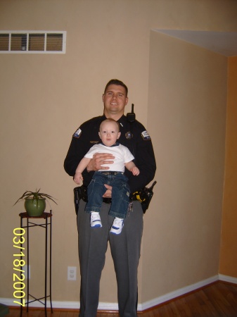 mikie and daddy in his uniform.