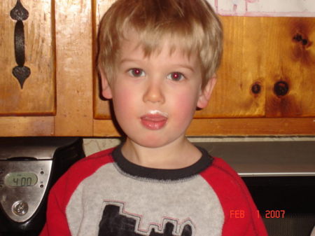 My son, Joe, (3) helping me make a cake