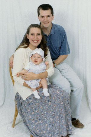 May 2000.  Family pose with new baby Kyra
