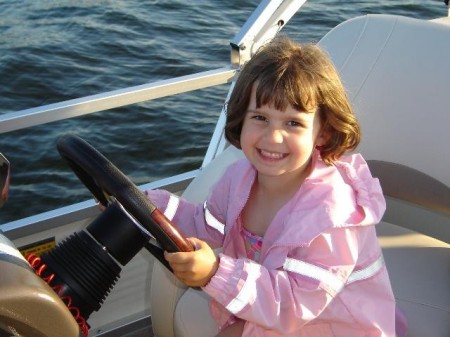 Haley navigating the pontoon boat