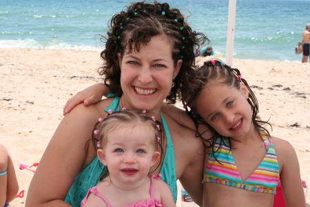 The girls and I on the beach with our hair braided