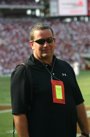 working the sidelines of a game at Alabama