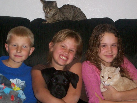 The kids... Hunter, Emily, Hunter with cats (Sasha and Libby) and Jack the puppy