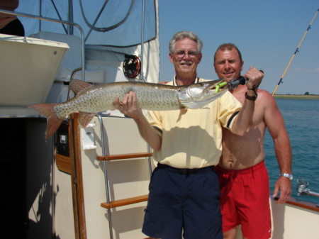 My Husband Ron & nephew Micheal on our boat on lk. st. clair