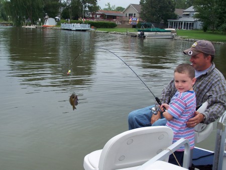 He caught his first fish...awe!!!
