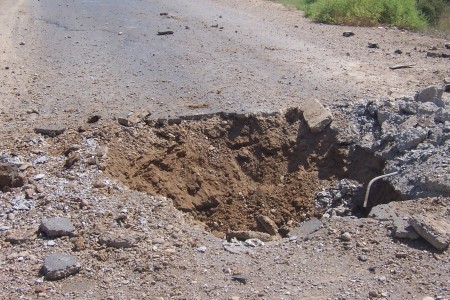 The crater from the roadside bomb