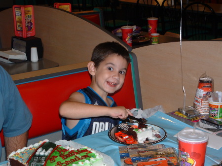 Xander's enjoying his cake.