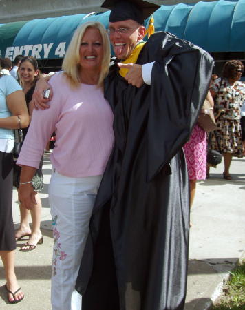 My son and I after he got his Masters... This yr.