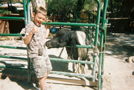 Austin getting tickled by a pony