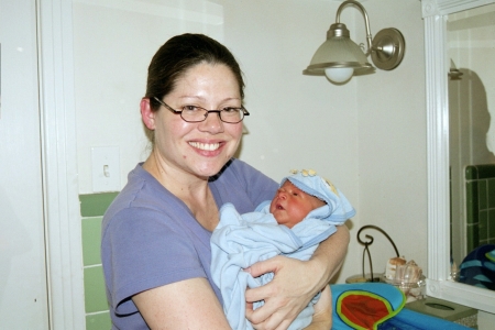 Tristan getting his first bath!!