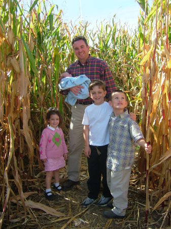 Bill and kids in corn-land