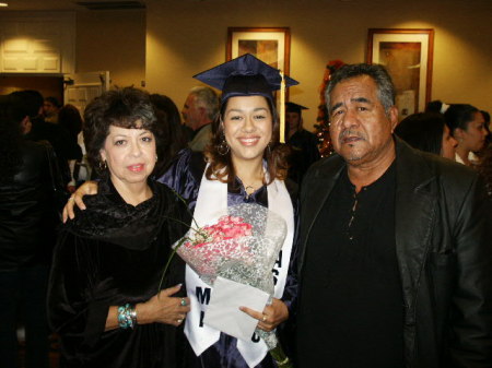 My oldest Dankia and her grandparnets Sonny and Martha Otero! ( Pima College Graduation )