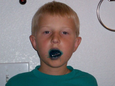 My son, Hunter, after eating a blueberry candy cane at Christmas