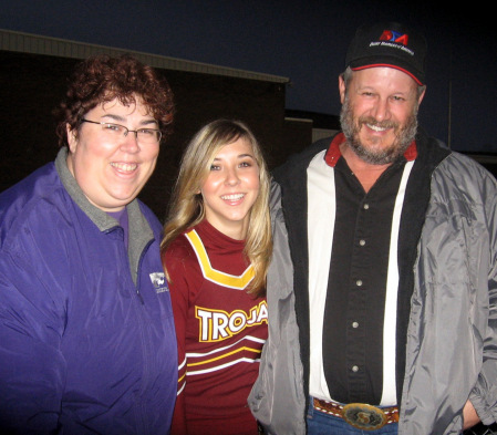 me, my husband Phil and my daughter Tabitha at Senior Night for football