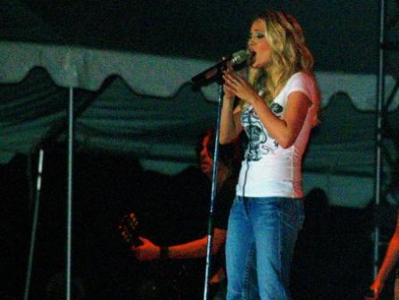 Carrie Underwood preformes at a concert that I sponsored>