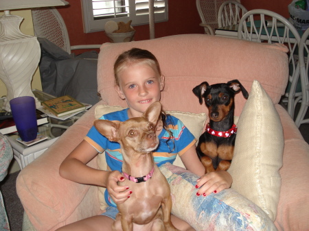 My granddaughter, Drew, with Ginger and Daisy